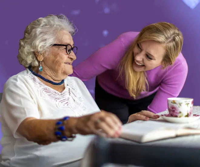 Deaconess Nurse Ministry worker checking up on a patient