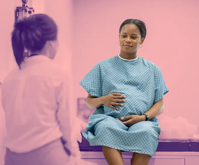 Photo of a woman visiting her doctor