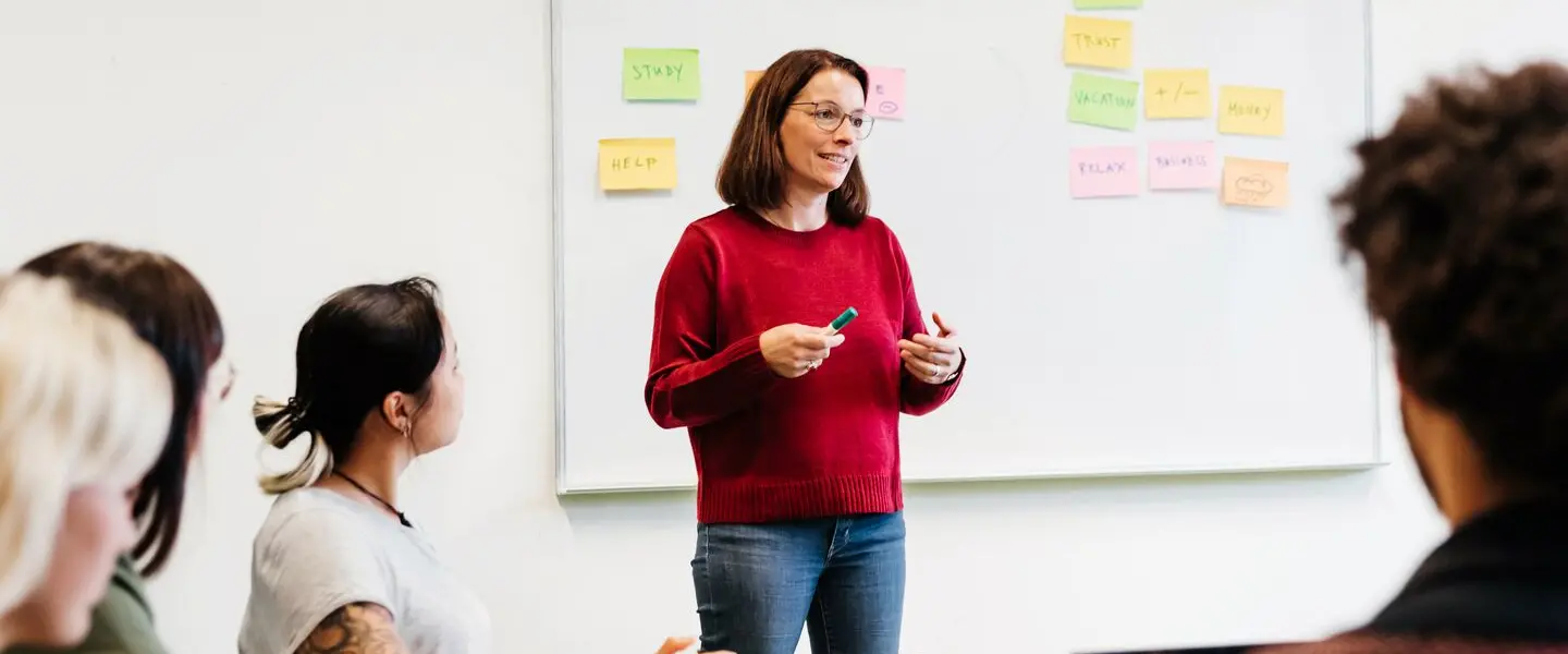 Photo of a woman informing others on how to improve their nonprofit organizations