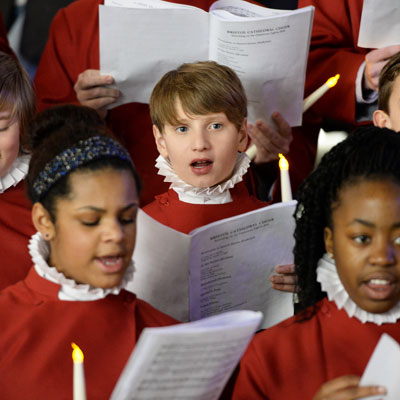 This photo of a choir shows the fundraising event idea of caroling for a cause and how it’s popular with faith-based organizations.