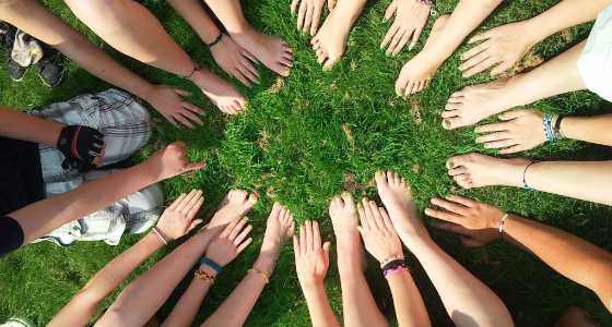 This photo of joined hands demonstrates the collaborative nature of the peer-to-peer campaigns as fundraising event ideas.