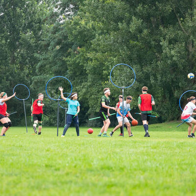 This photo of a Muggle Quidditch match shows the popularity of the sports team fundraising event idea of a wacky sports tournament.