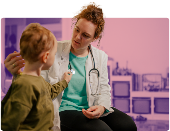 A doctor administers care to a child