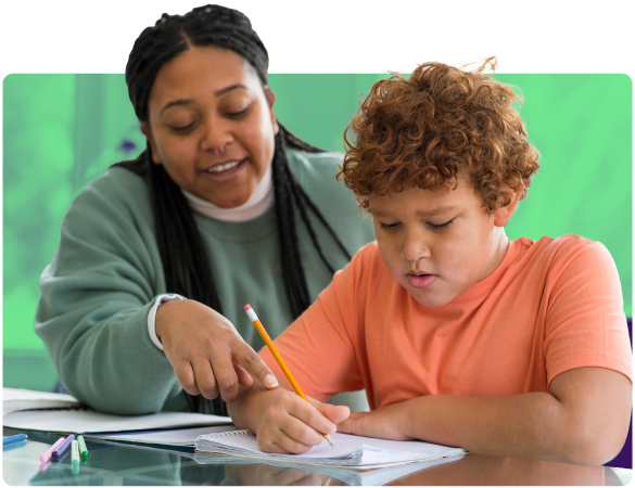 A human service worker assists a child with homework