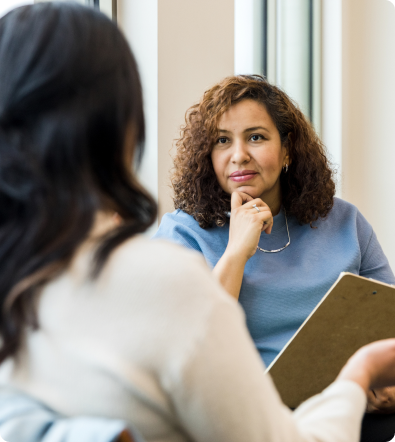 An NVMHF consultant talking with a client