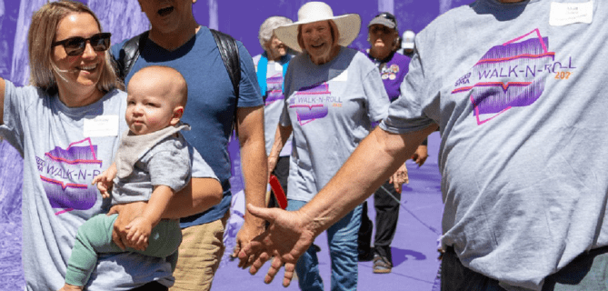 Volunteers participate in a Cure SMA walk-a-thon