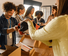 Volunteers pack supplies for emergency relief efforts.