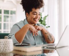 Woman having a virtual meeting on her laptop.