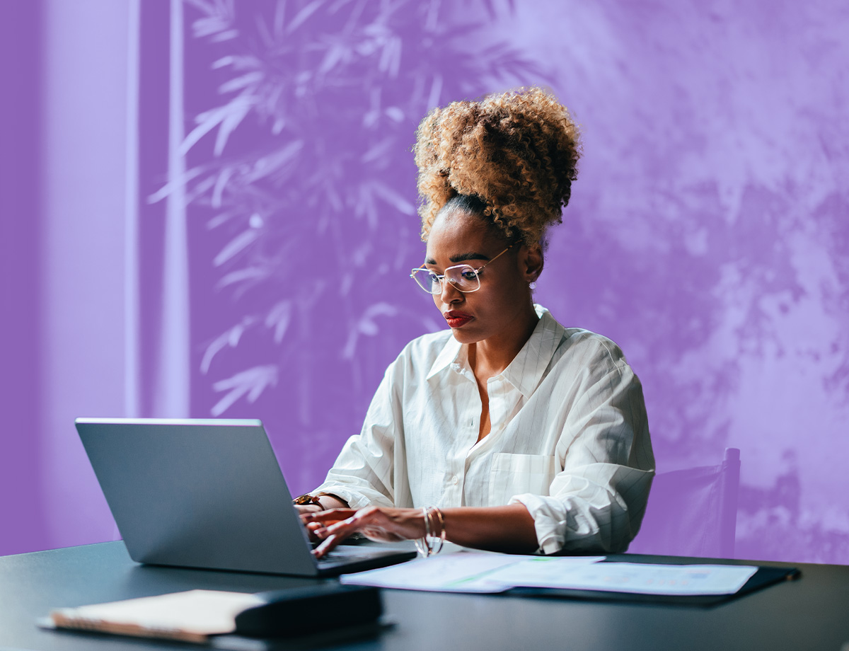 A photo of someone looking at a nonprofit reporting software dashboard.