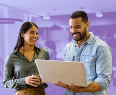 photo of two people reviewing charitable giving platforms.