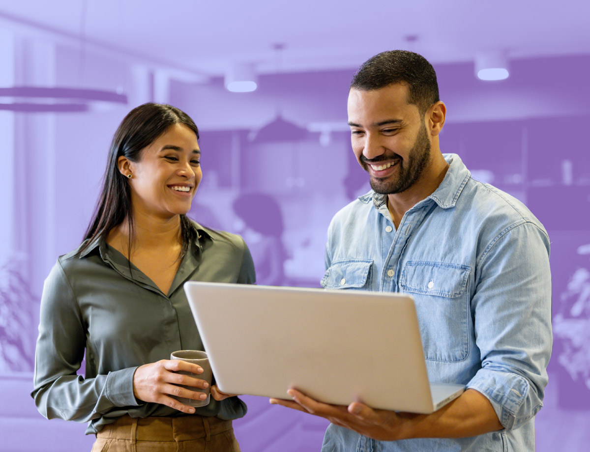 photo of two people reviewing charitable giving platforms.