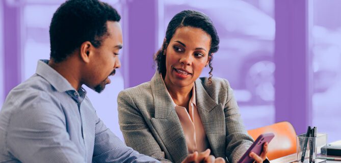 A person meeting with a financial advisor to discuss planned giving options.